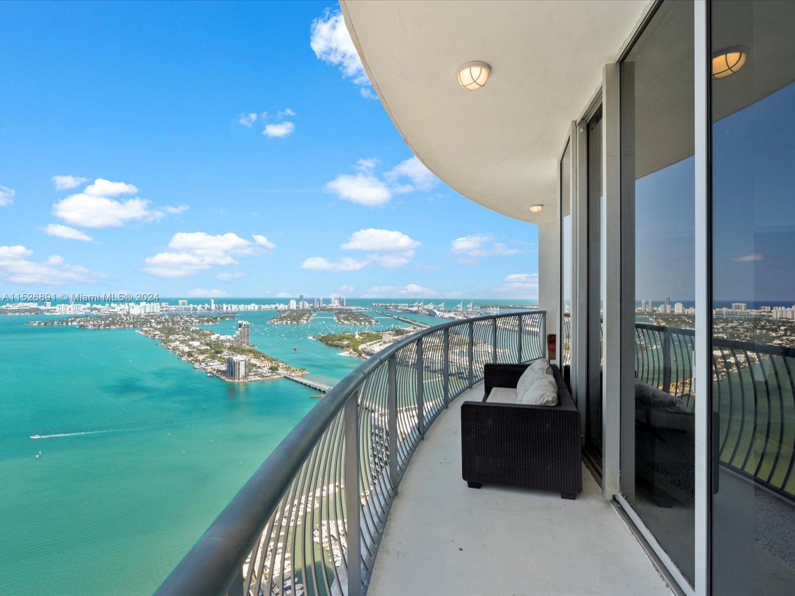 Now Available! Top floor Penthouse unit on 56th level in the coveted '01 line. Endless Eastern views of Biscayne Bay & Miami Beach. Furnished or unfurnished 2 bd/ 2 ba, 12-foot high ceilings, washer/dryer in unit, & premium parking space on 2nd level. The Opera Tower has a new state-of-the-art fitness center & pool, facial recognition entry, 24 hr Mini Market, wine market, barber shop, restaurant and bar on-site, 24/7 Valet, & Security. Outside your front door is Pura Vida, Cassadonna, and Margaret Pace Park w/ Tennis, Volleyball, Basketball, Jogging Path, Dog Park, BBQ, etc. In popular Edgewater area, minutes from Downtown, Arts & Entertainment District, Wynwood, Midtown & Design District, 10 min to South Beach & steps to pedestrian-friendly Venetian Causeway. No Short Term.