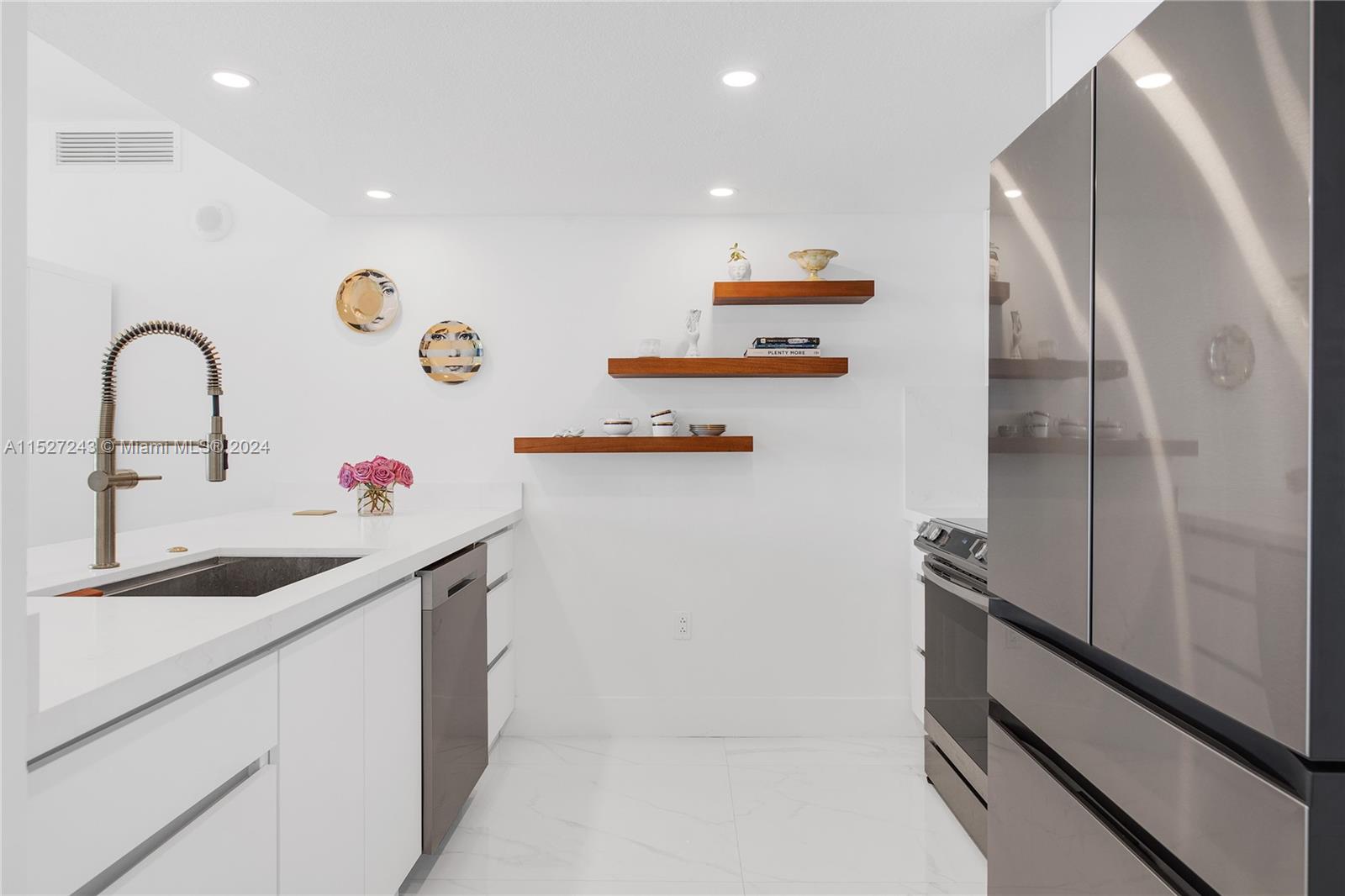 Custom cabinetry + quartz countertops