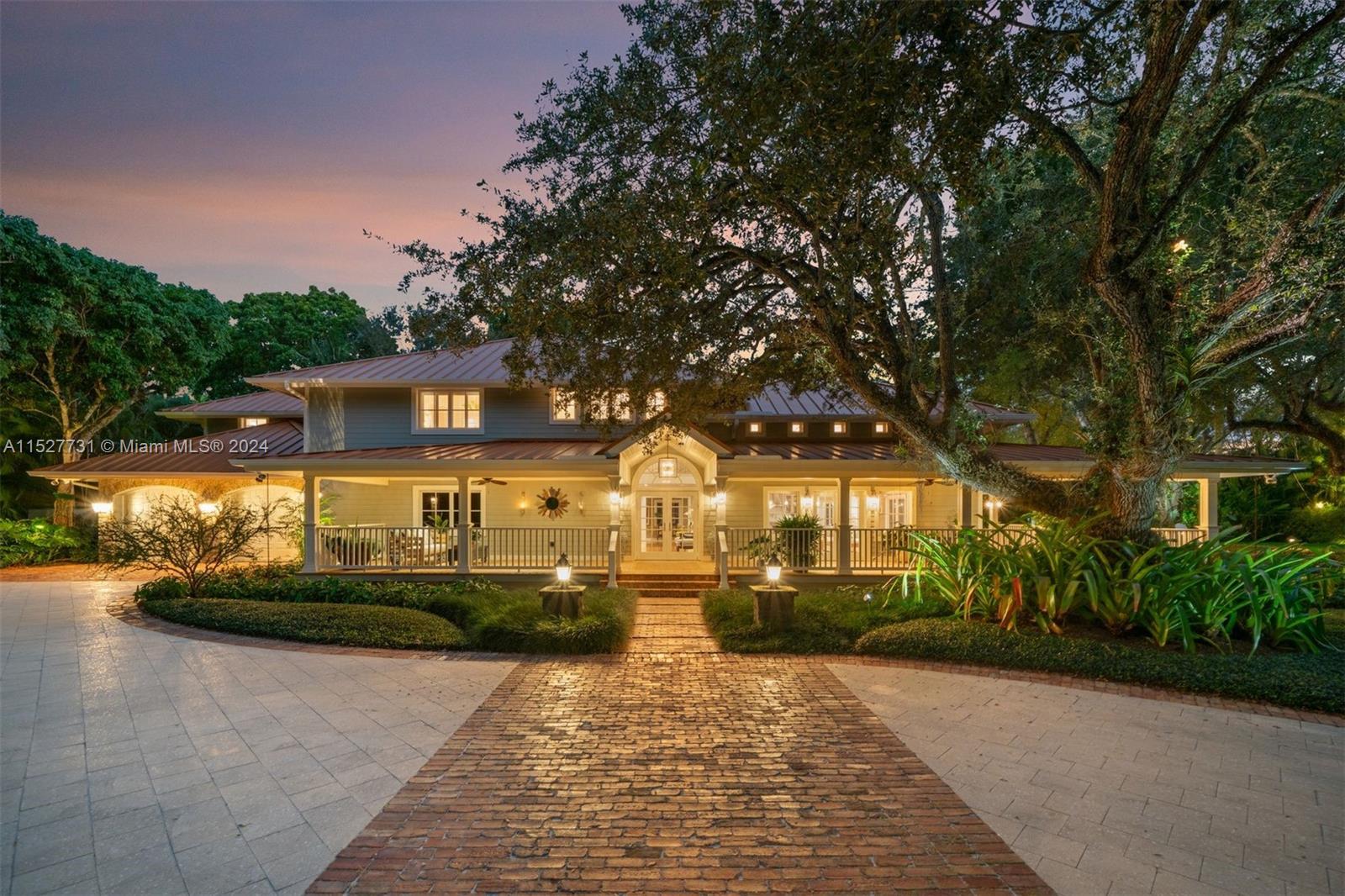 Located in the guard-gated Banyan Lakes neighborhood, this 2003 custom Old Florida estate-style home w/ wraparound porches spans 8,765 SF &amp; is the epitome of sophisticated living.  Situated on a 50,000+ sf lot that is nothing short of magical w/ live oaks, terraced lawn, &amp; lush landscaping around the lagoon-style pool &amp; patio. The 6 BR, 5.2 BA home w/ floorplan that calls for entertaining features a formal liv rm that opens to a zen garden &amp; family rm w/ custom built-ins &amp; fireplace. The bespoke kitchen incl Caesarstone counters, Wolfe &amp; Subzero appliances, banquette &amp; butlers pantry.  The primary ste has  large BR, gym, 2 walk-ins, &amp; spa-like BA. There are 4 add’l BRs upstairs + office. White oak floors, impact glass, 2014 metal roof, generator, 2-car gar are some of the special features.