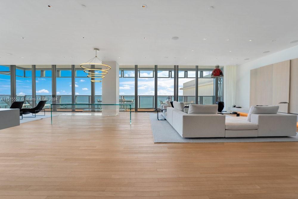 Ian Schrager presents this spectacular fully finished 4 bedroom 4.5 bath ocean-front residence designed by John Pawson &amp; Suzanne Lovell Inc. This limited one-of-a-kind residence is located between the ocean and bay with breathtaking views of each. From the front door, the space opens up onto the Great Room, which offers unobstructed ocean views and full terrace access. The Living Room and Lounge Areas anchor the space with ample seating, and the clean and contemporary details of the sound system conceal or reveal the technology behind. A full bar is discretely organized behind millwork in the Entry Foyer and offers bar seating with a lavish space for entertaining. Enjoy 24-hour five-star world class service and amenities, poolside cabanas, resident-only beach club, and more.