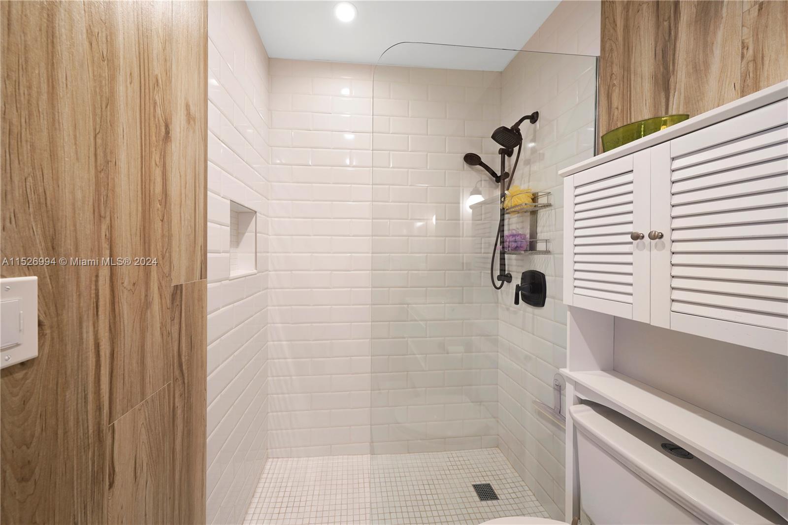 SUBWAY TILE, GLASS SHOWER ENCLOSURE