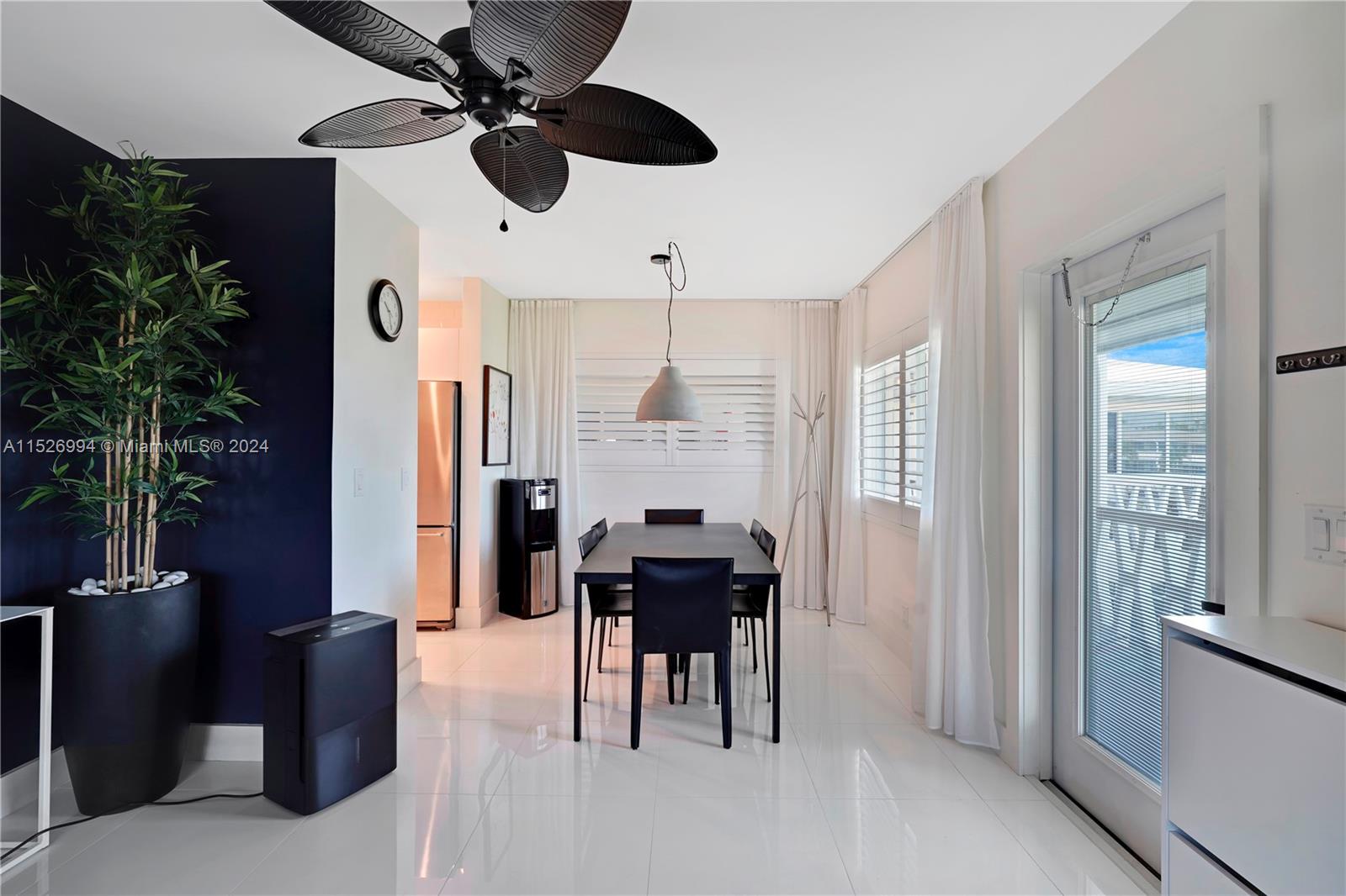 6 CHAIRS & TABLES,  SHINY WHITE TILES, PLANTATION SHUTTERS