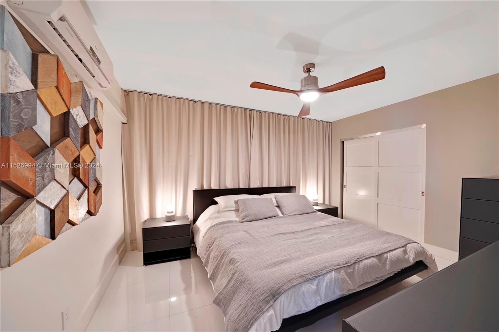 OVERSIZED BEDROOM WITH MODERN FURNISHINGS
