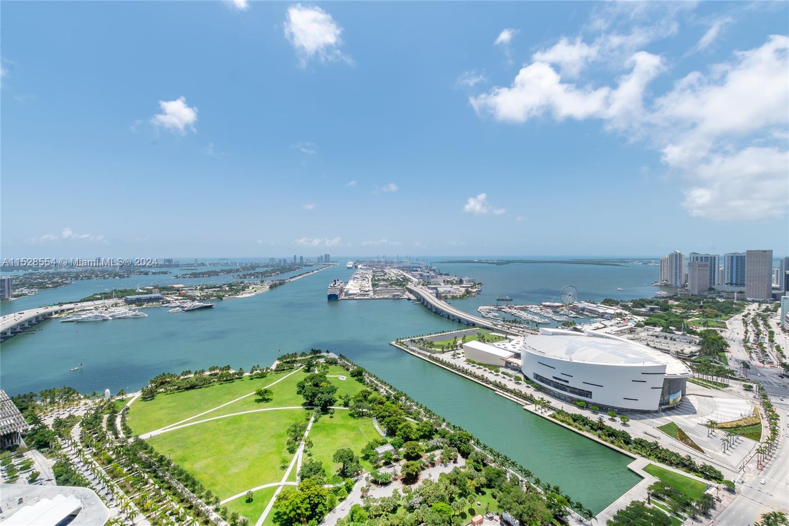 Exquisite 3-STORY PENTHOUSE in the heart of downtown Miami offers breathtaking OCEAN, BAY, & CITY VIEWS. Featuring 4,264 SQFT w/ 3 BEDS & 5.5 BATHS, the first floor features a modern OPEN LAYOUT with kitchen, living, and  dining areas. Discover a welcoming guest bedroom w/ a full ensuite bath. Ascend to the SECOND FLOOR, where you'll encounter the expansive master bedroom. The master ensuite is designed with a double sink and standing shower for added comfort. There is a secondary bedroom on this floor, complete w/ its own full ensuite. The crowning jewel is the THIRD-FLOOR TERECE, complete w/ a PRIVATE POOL & a FULLY EQUIPPED BAR featuring a sink & refrigerator. Just a few steps to the Kesaya Arena, 10/15 minute drive to Miami Beach, Wynwood, & Design District, location cannot be beaten!