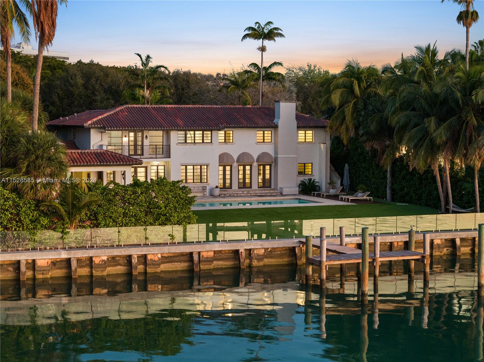Spanish Mediterranean Architectural beauty on gated & private Bay point .  Enjoy dramatic yet serene sunrise open bay views w/ 120’ of WF on a 23,100sf on the Bay.  This 6,560sf, 7 bed waterfront home w/ covered cabana, 3 car garage features a large pool, covered barbecue area & storage room. Beautifully landscaped , gated property providing shade & privacy. Oversized primary suite w/ separate sitting area walk-in closet and bathrooms with balcony overlooking patio. Stunning foyer, high ceilings with curved staircase and herring bone wood floors. 4bed upstairs all w/ water views & midnight bar, nanny room, guest suite & large den on ground floor. Home is wired for surround sound & security cameras. Minutes to Downtown, Design District, airport, top schools & vibrant night-life.