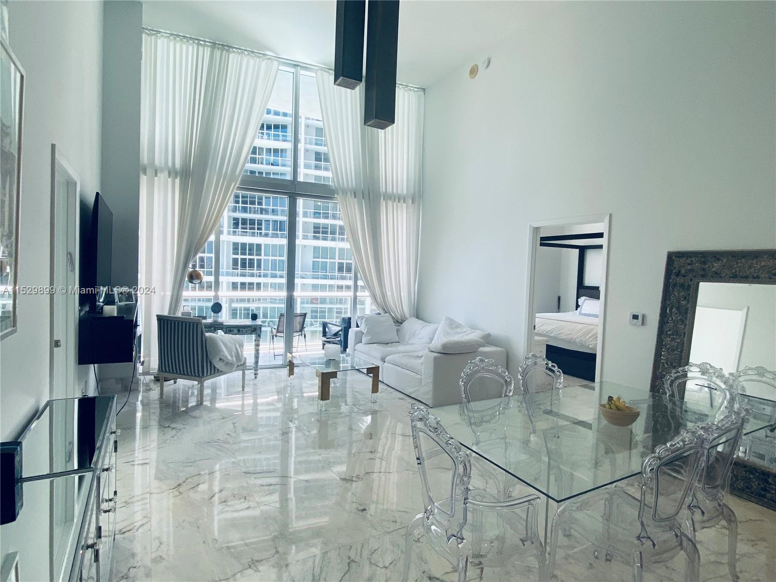 ABSOLUTELY STUNNING DOUBLE HEIGHT 2BR/2BA + DEN... MARBLE FLOORING THROUGHOUT & CUSTOM DESIGNER LIGHTING FIXTURES.. ENJOY SPECTACULAR VIEWS OVERLOOKING THE ICON BRICKELL POOL AND BISCAYNE BAY. WOLF AND SUBZERO APPLIANCES. 5STAR AMENITIES INCLUDING STATE OF THE ARTS FITNESS CENTER, INFINITY POOL, CIPRIANI'S, CANTINA VIENTE & ADDIKT ALL ON PREMISES. WALKING DISTANCE TO BRICKELL CITY CENTER, ENDLESS RESTAURANTS, SHOPPING AND THE MIAMI FINANCIAL DISTRICT.