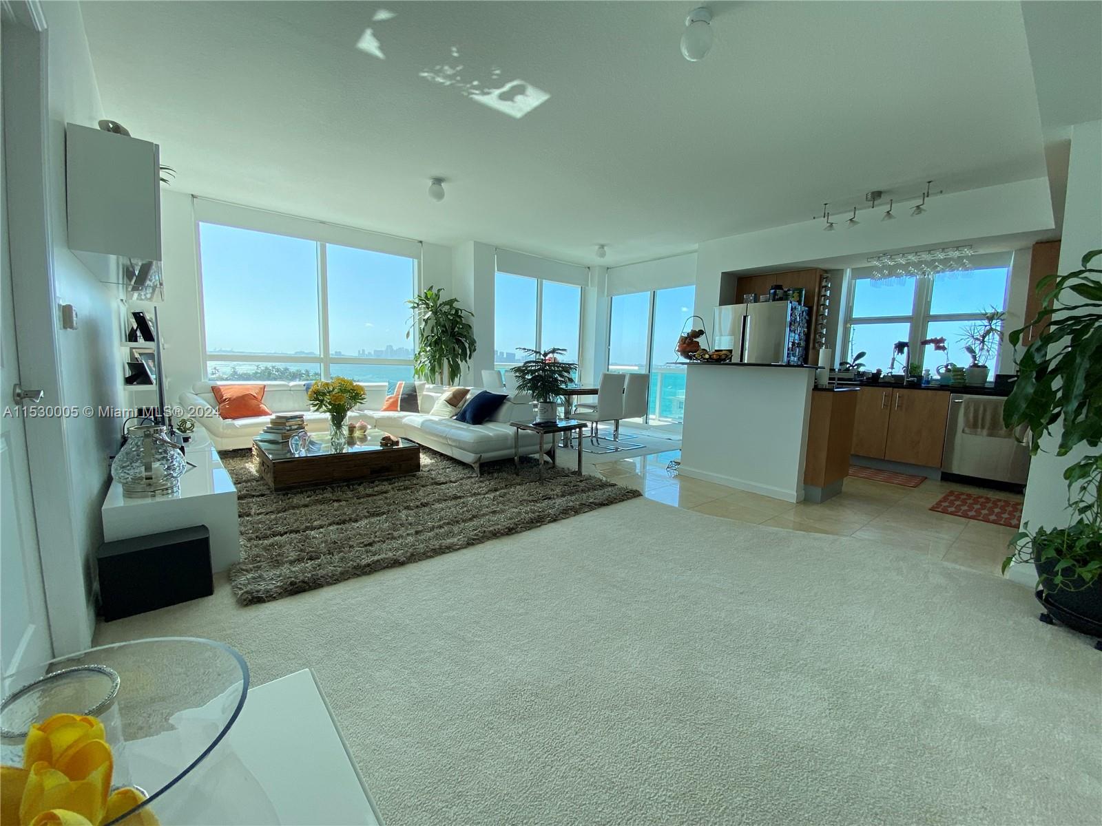 Coastal living in this 2-bedroom condo with a large enclosed Den, 2 bathrooms, and breathtaking views of the Intracoastal Waterway. Located in North Bay Village, this residence offers a serene escape with all the conveniences of city life. Expansive windows showcasing panoramic views of the beautiful Intracoastal Waterway. Balconies with stunning views, perfect for morning coffee or evening relaxation. Amenities include a fitness center, pool, and communal spaces for socializing. It comes with two assigned parking spaces for added convenience.