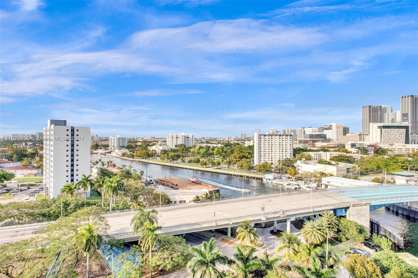 ATTENTION INVESTORS: This 1 bedroom 1 bath is rented at $2200 until 4/24/2025. It has GORGEOUS views of the Miami River that can be seen while sitting in the living room, bedroom or on the balcony. This lovely condo features an open kitchen with European cabinetry and stainless steel appliances. The refrigerator is less than 2 years old. There is laminate wood floors throughout and the Seller installed sliding opaque doors to the bedroom for added privacy. There are also custom closets for additional closet & storage space. This is a full amenity building with an Infinity edge pool, jacuzzi, fitness center, clubhouse, business center, dog park, lobby level restaurant & 24 hour security. The pool deck is currently under construction and is estimated to reopen in August or September.