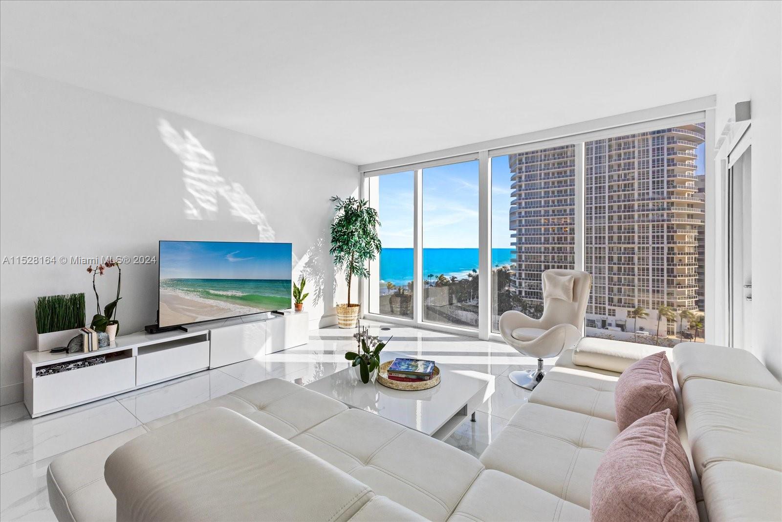 Beautifully renovated 1bed 1.5 baths with southern exposure. Tranquil ocean views and views of the Miami Skyline from this bright and spacious 900/SF unit featuring white porcelain floors throughout, new bathrooms, updated kitchen, new washer and dryer, closet built-ins. Large balcony with access from the living and bedroom. Unit comes fully furnished. Unit comes with 1 parking space. Full service building with beach service, fully equipped gym, Sardinia cafe, theater and social room, 24 hour security and valet. Contact Listing Agent for more information.