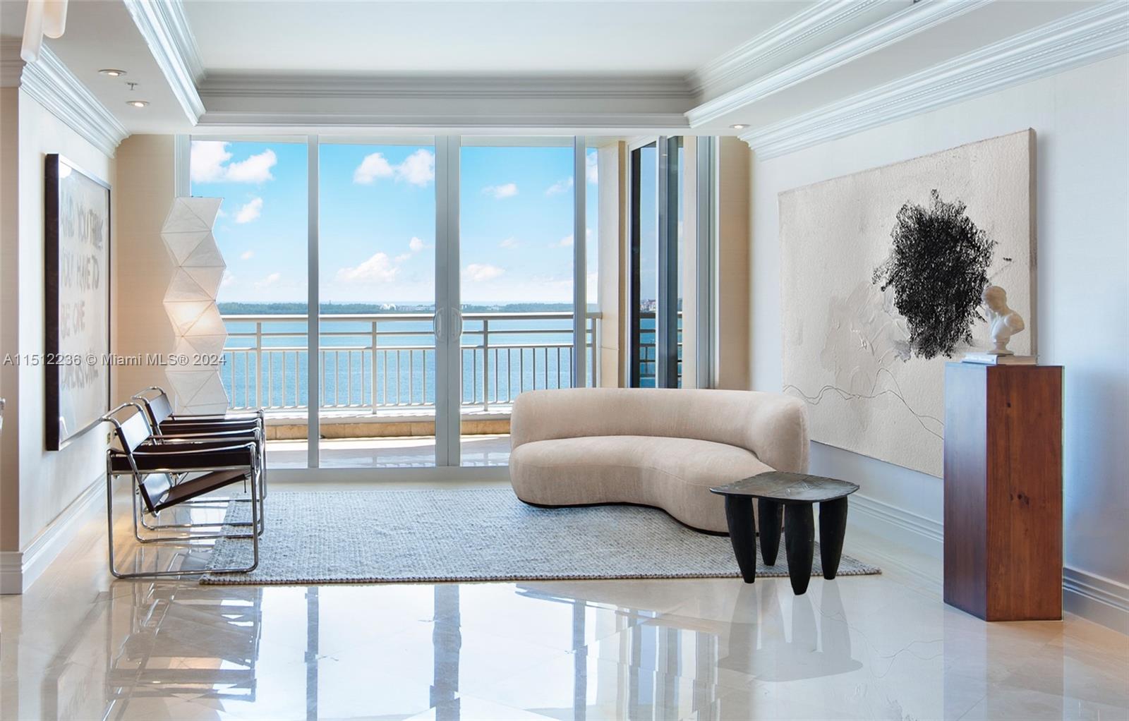 Elegance meets serenity in this meticulously reimagined 2 bed/2.5 bath condo with unobstructed ocean views. Step through the custom MOLON Rosewood doors with palisander inlays into a realm of refinement. The airy layout, adorned with light-hued marble floors, German silk wallpaper and bespoke lighting throughout, embodies luxury. A chef's dream, the French-inspired kitchen boasts high-end appliances. Unwind in the sprawling Primary Suite with its walk-in closet and lavish open-style bath. With craftsmanship that's second to none and panoramic ocean views that promise sunrise serenades and moonlit marvels, this residence is a true gem. Over $1M invested ensures unmatched quality. Welcome to your coastal sanctuary.