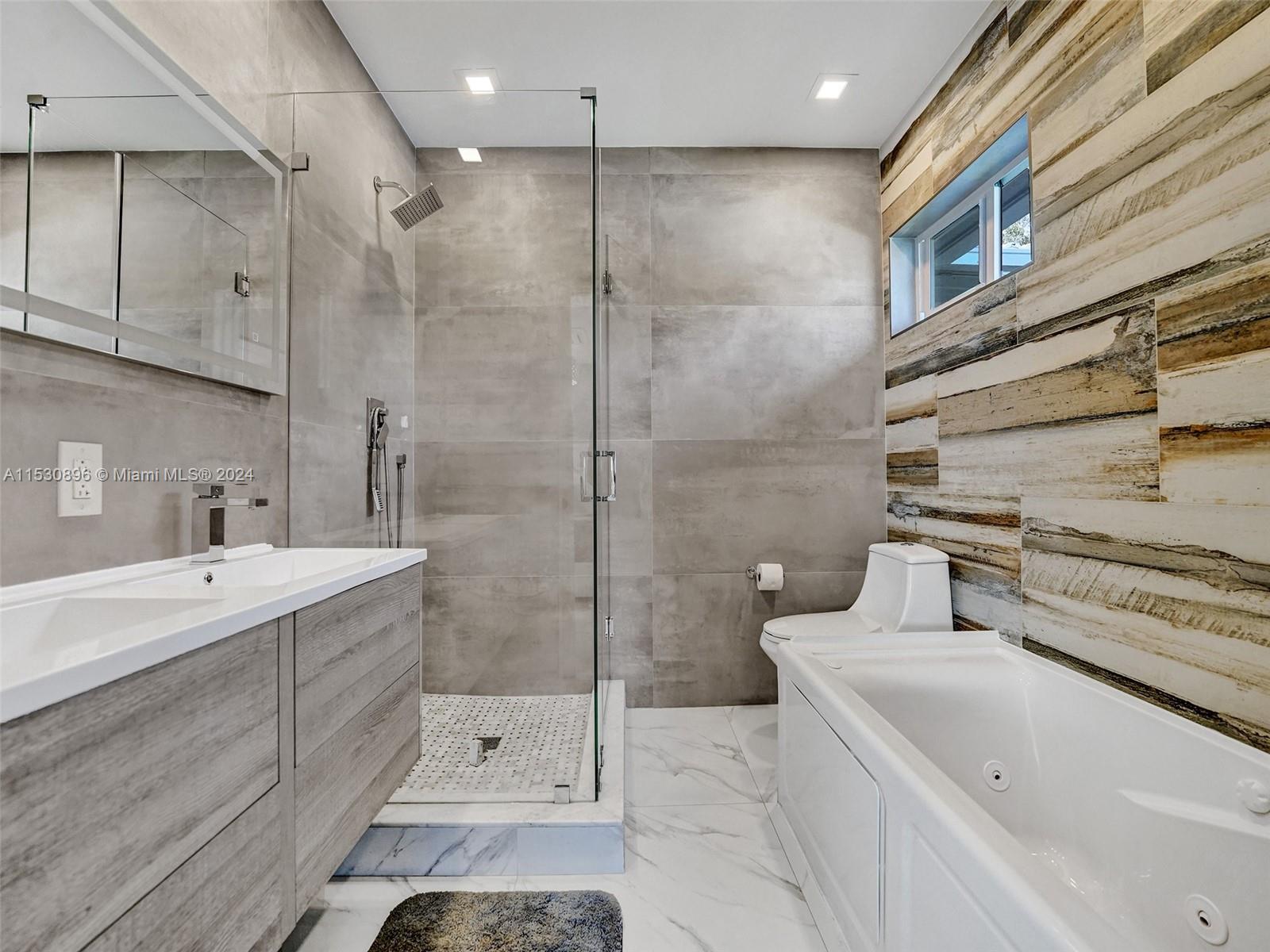 Remodeled Bath with tub and shower