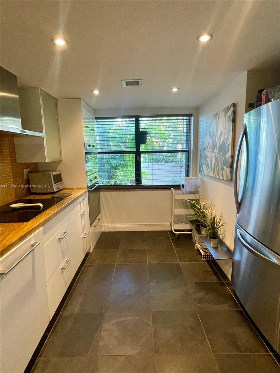 Spacious kitchen with SS appliances