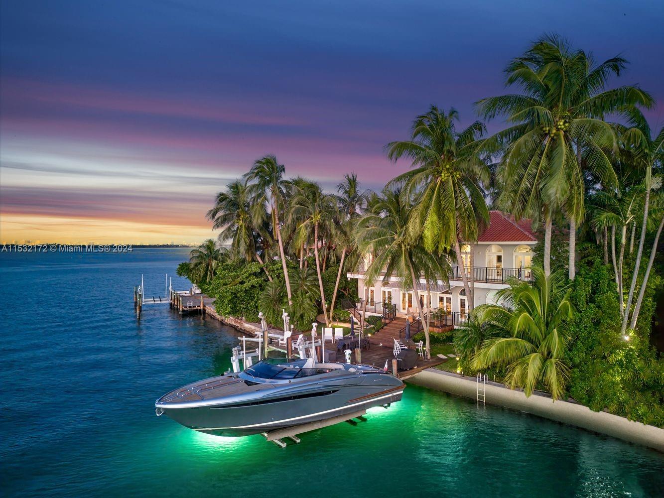 One of the very best lots on the Venetian Islands is now available. An oversized corner lot with 13,383 square feet and an extremely rare 123 feet of waterfrontage, ideally positioned at the very tip of Dilido Island far from the action bustle. Whether by day or night, one can enjoy postcard perfect unobstructed and direct western open bay views of the Miami skyline. Situated on this forever lot is a beautifully renovated 4 bedroom - 5 bathroom home with separate guest house featuring an oasis style front yard and pool area completely obscured from the street. Excellent layout with noticeably high ceilings on both levels, an expansive master suite with giant walk-in closets, and a massive windowed master bathroom from which to indulge in panoramic views.