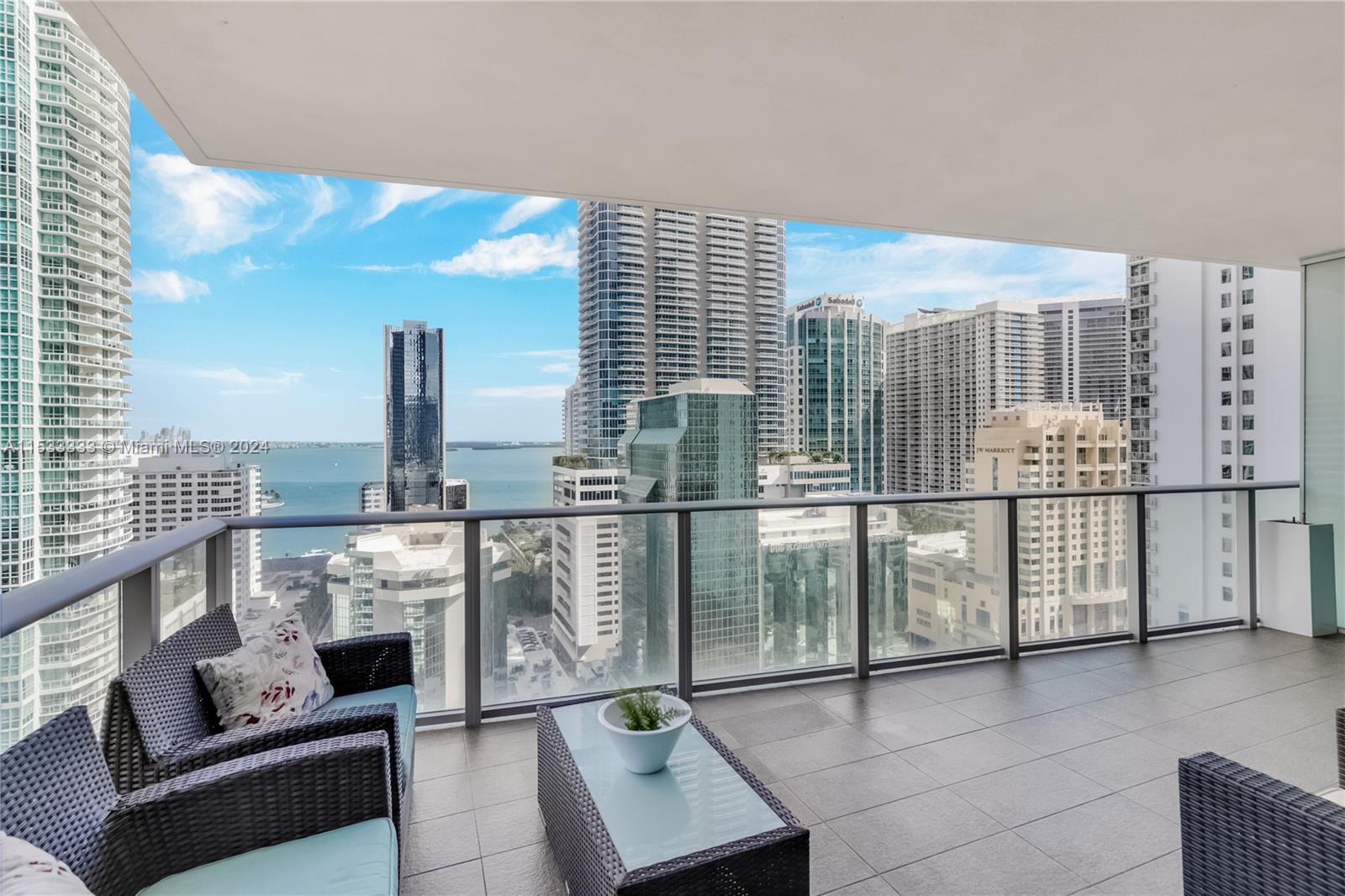 Easy to show! Resort lifestyle & the most spectacular NE BAY & BRICKELL CITY VIEWS. Fully finished corner unit perfectly located at the 22nd floor, at the most desirable line, & is being priced to sell: 3BR+DEN/3BA, private elevator, expansive balcony w/Summer Kitchen & wood tile floors. By Architects Sieger Suarez, 1010BRICKELL is the only family oriented condominium in the heart of Brickell, offering phenomenal common areas: Outdoor Running Track, Squash Court, indoor & outdoor swimming pool, kids gym, Game Room, Bowling Lanes, Arcades Games, Playground & Private Social Room for Adults w/Virtual golf simulator +State-of-the-art fitness center, Business Ctr & Spa. ROOF TOP TERRACE w/Swimming Pool, Glass Jacuzzi, Endless Pool to swim against, Outdoor movie theater,BBQ grills
