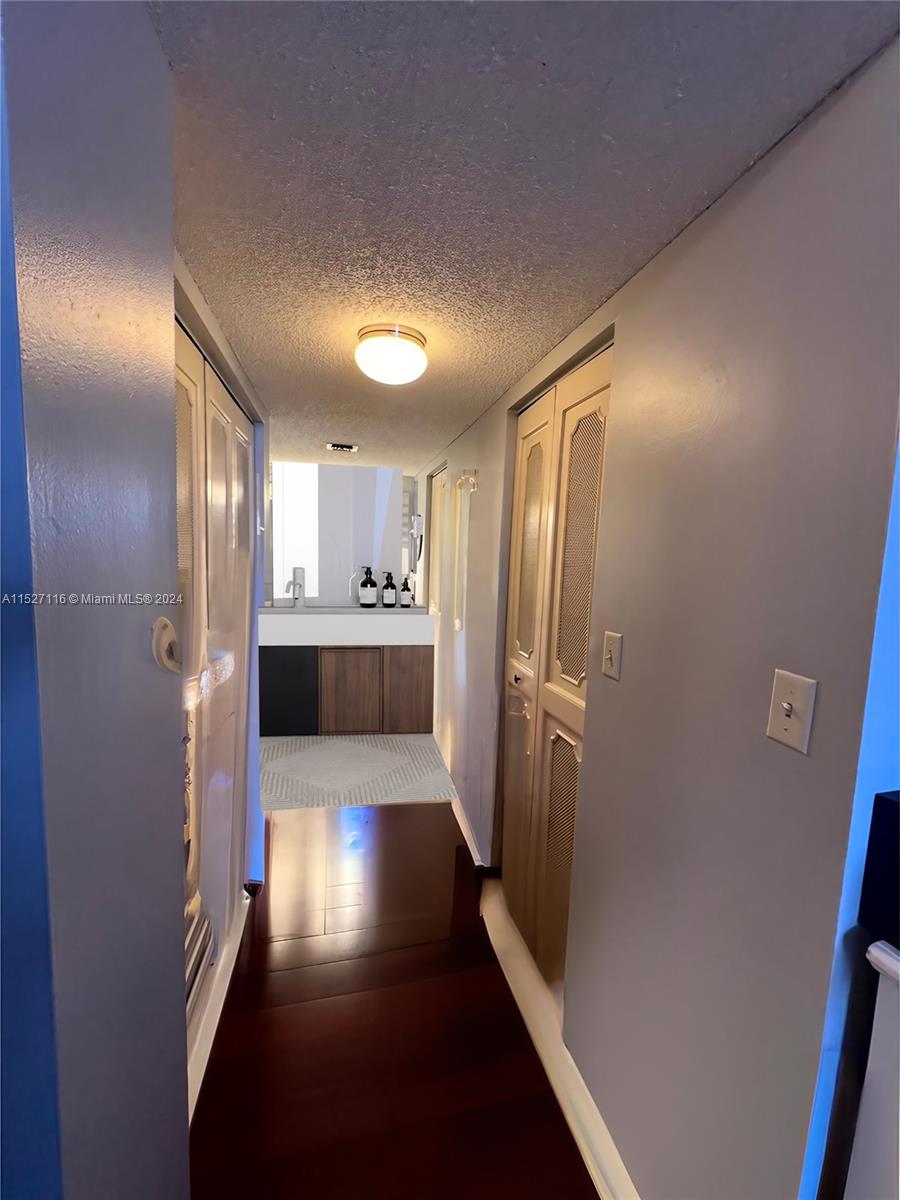 Mast bedroom hall to bathroom and closets, Digitally Decluttered