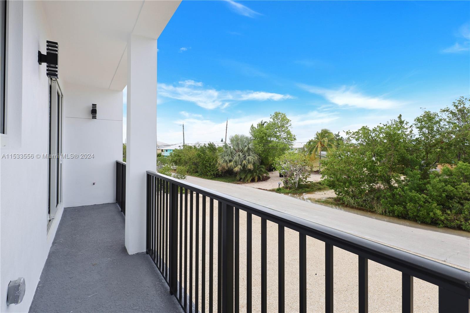 Front Balcony off of the kitchen and dining room