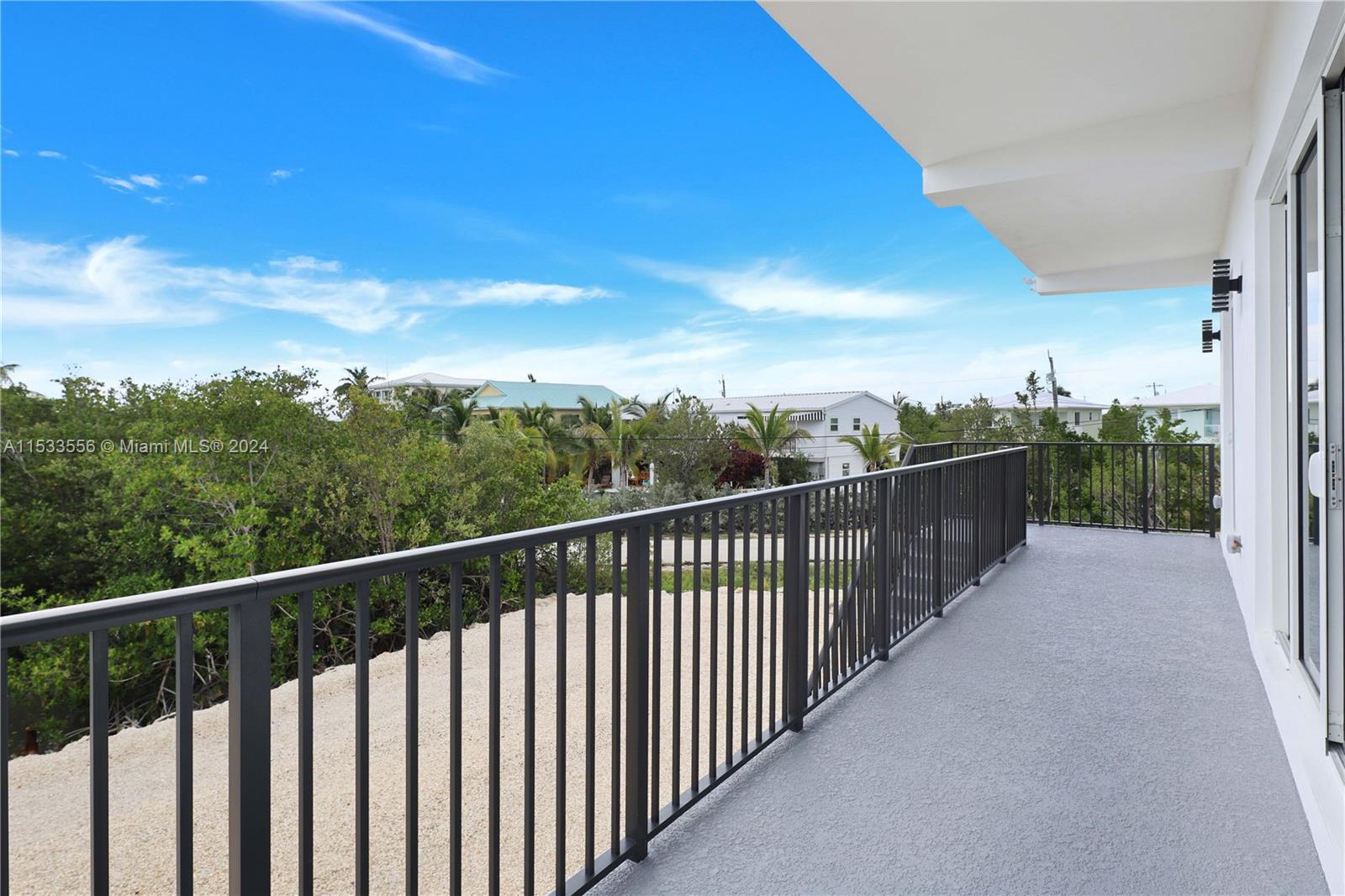 Back Balcony overlooking the 36' dock and 12'x26' pool (in permitting)