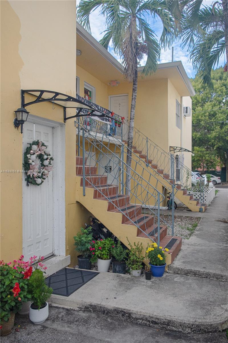 East walkway leading to all units main entrances.