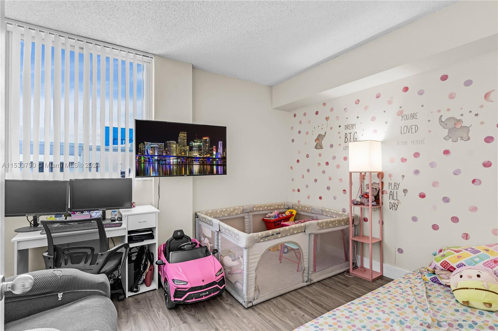 the window provides natural light thru the bedroom