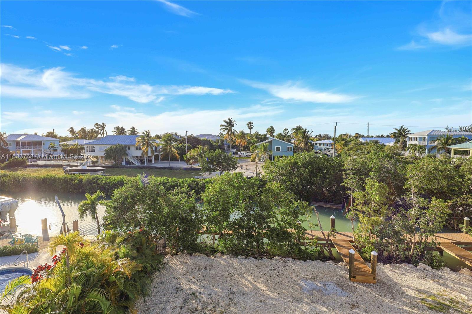 52-foot dock installed, 12'x26' pool and custom pavers in permitting