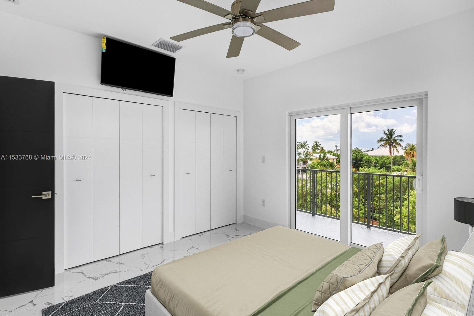 2nd Floor guest bedroom en-suite - back of house, virtually staged