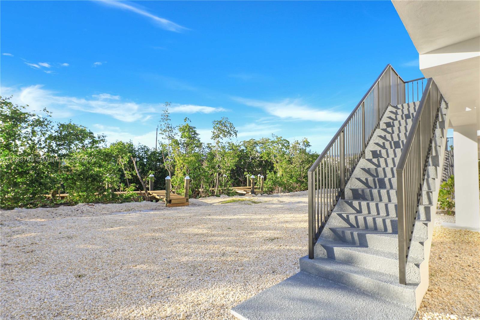 52-foot dock installed, 12'x26' pool and custom pavers in permitting