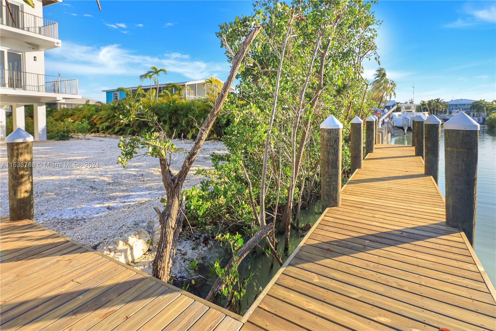 52-foot dock installed, 12'x26' pool and custom pavers in permitting