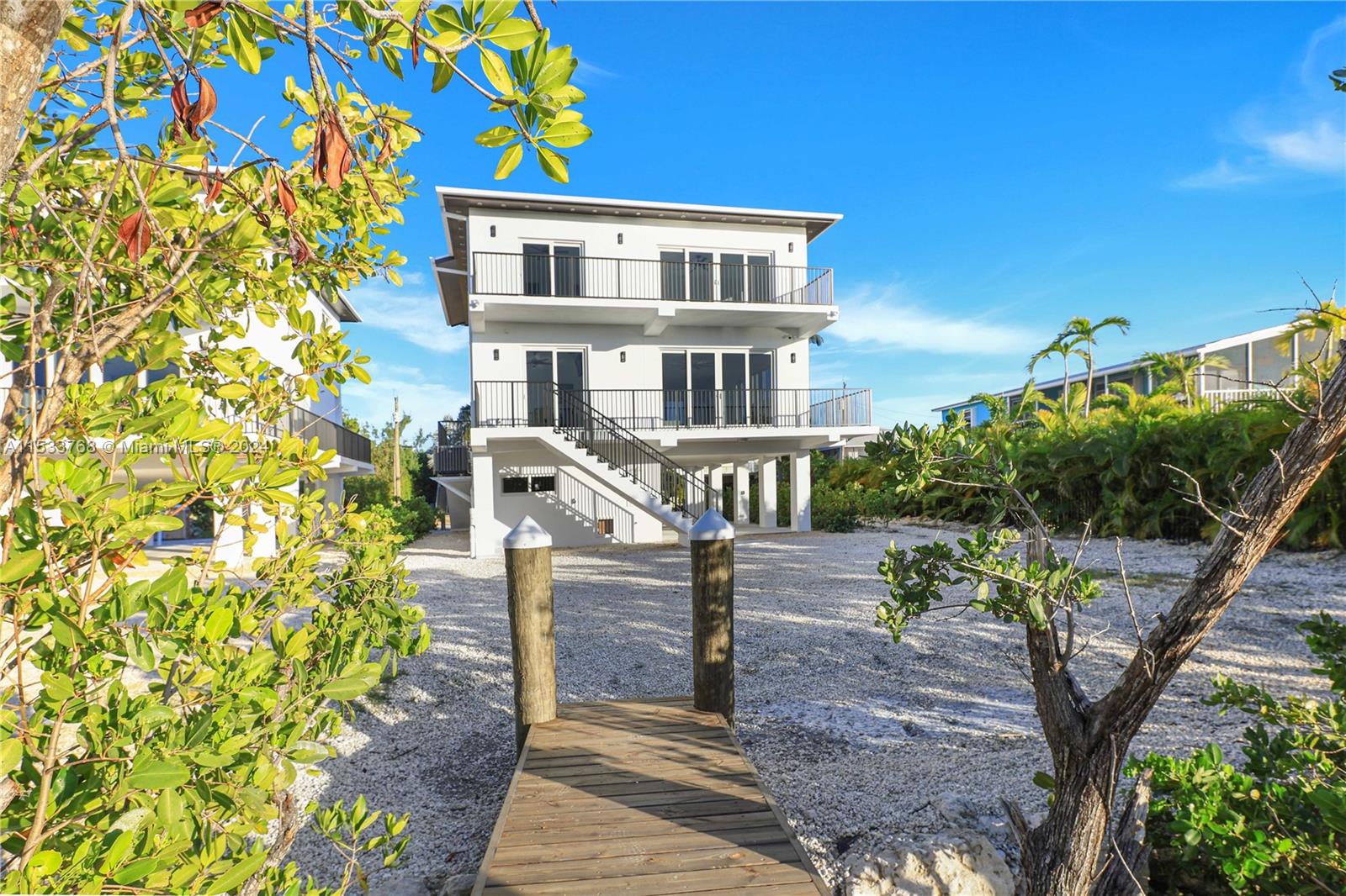 52-foot dock installed, 12'x26' pool and custom pavers in permitting