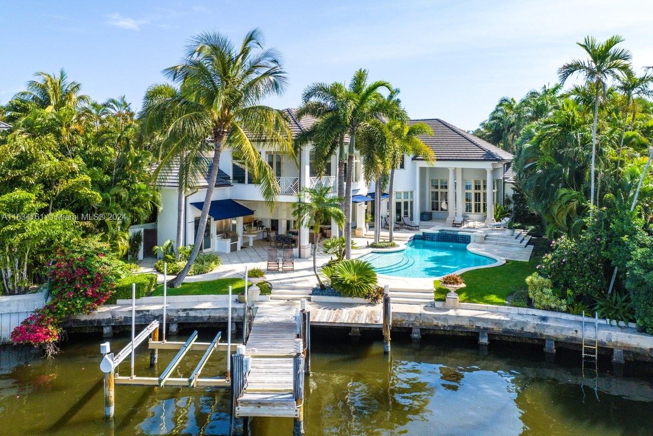 616 Seasage Dr. exemplifies intracoastal waterside living at its finest!  Nestled on a private yacht basin setback 120 yards from the main intracoastal waterway in the most coveted island side neighborhood in Delray Beach.  The ocean and Seagate Beach club are only 459 steps off the front door.  Designed by famed architect Randall Stofft is his most personal creation (his original home) which captures his passion for creating an exquisite timeless everlasting design that results in endless “jaw dropping” experiences as you walk from room to room.  Two covered terraces guarantee year-round use as even in the hottest of times, the outside is cool from its shading.  The way these terraces have been incorporated into the design of the home turns a 6815 sq. ft. home into a 7800 sq. ft. home.