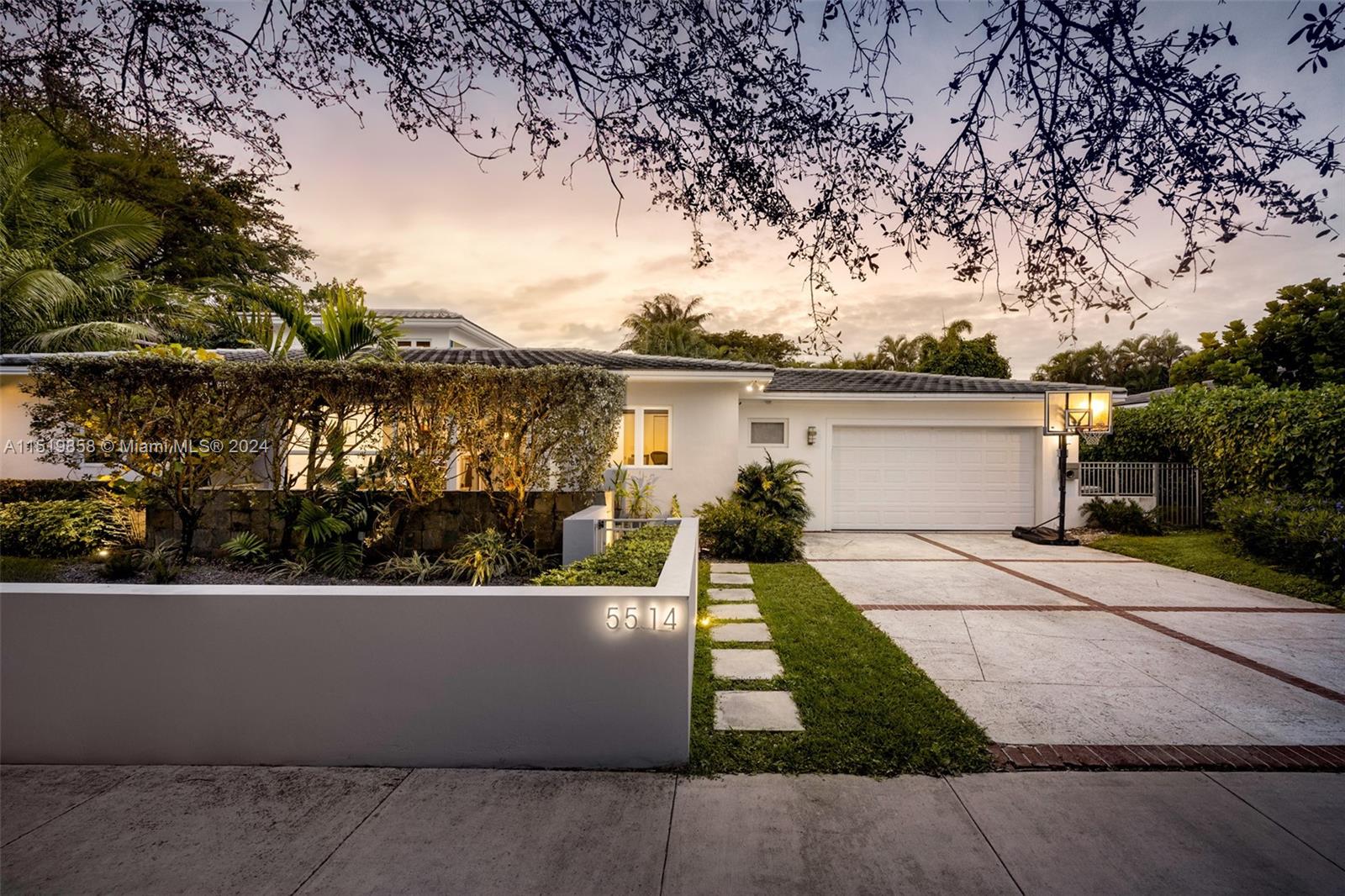 This modern mid-century style home in the sought-after South Coral Gables neighborhood is a true gem. Updated in 2008, this property seamlessly blends contemporary amenities with the timeless appeal of mid-century design.
Boasting 5 bedrooms and 4 bathrooms, this home provides ample space for both privacy and shared moments. The addition of a den/loft office adds versatility, making it an ideal space for work or relaxation.
The floor-to-ceiling impact windows and doors not only flood the interiors with natural light but also offer stunning views of the surrounding landscape.  The open floor plan is a highlight, creating a fluid and dynamic living space that is perfect for entertaining.