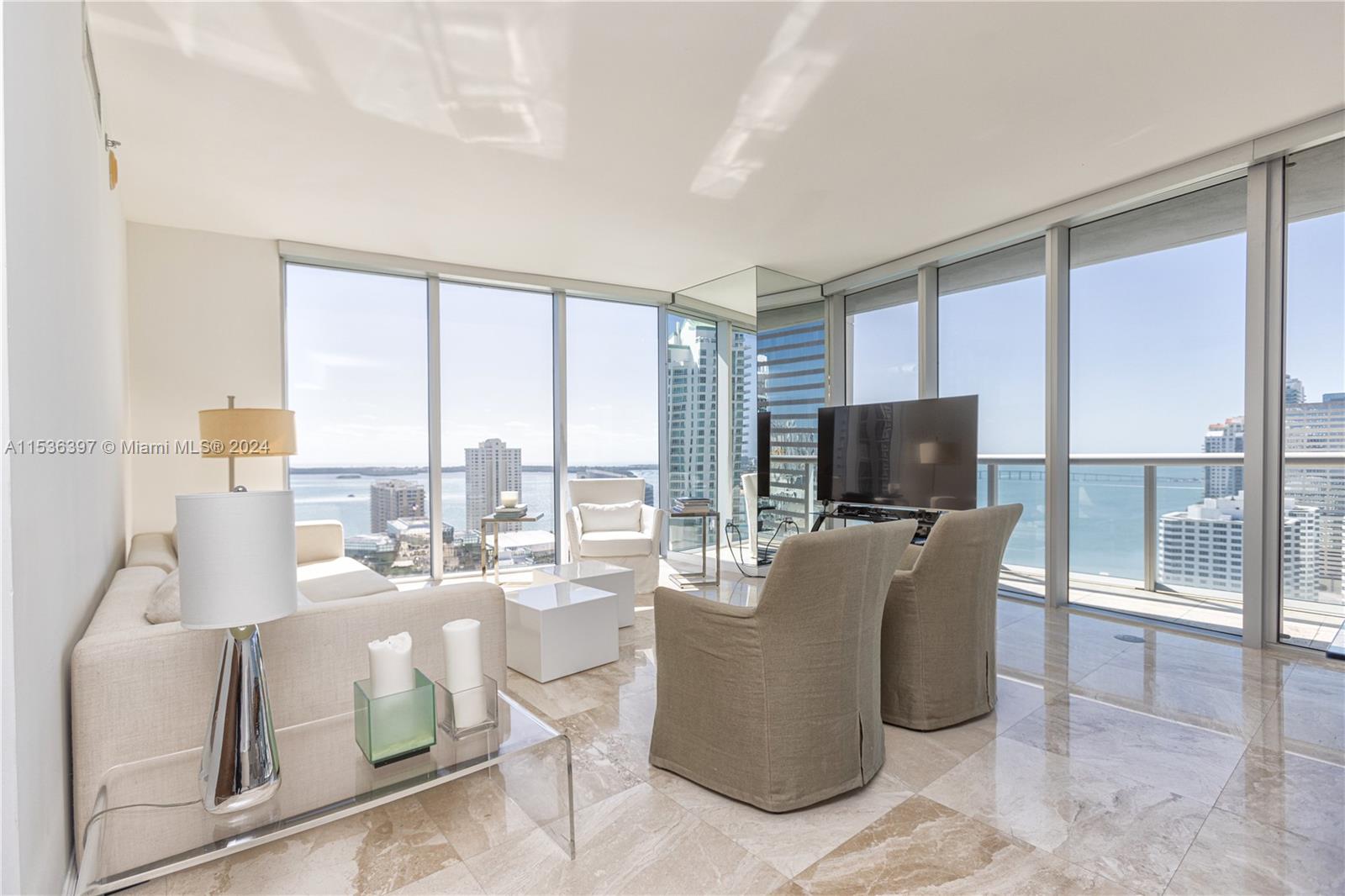 Breathtaking views from this corner unit in Tcon Brickell, located on the 26th floor. Best line The “01”. A spacious Corner 1,870 sqft + large balcony. Breathtaking views of Key Biscayne, Fisher Island, South Pointe, Miami Beach, and more. Unobstructed water views from every room. Icon Brickell is home to the finest amenities Miami has to offer. Designed by the renowned Arquitectonica and interiors inspired by Yoo by Philippe Starck. Top of the line amenities. Including the largest residential pool in Miami, a world class spa with cold pool, steam room, juice bar, state of the art fitness center, valet service, concierge service, secured elevators, 5 star restaurants on the first floor.