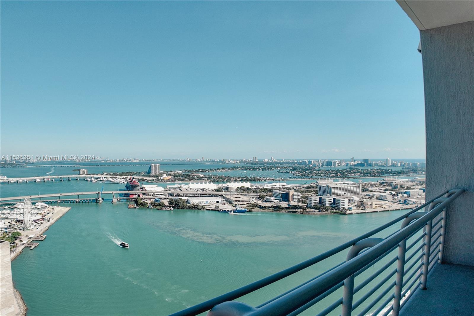 Live limitlessly in this sleek, stylish PENTHOUSE condo that offers 12'ft ceilings w/ endless views of Biscayne Bay, Port of Miami and Miami Beach. This highly sought after "10 line" offers an open concept that features 846SF of ample living, new lighting & tasteful renovations throughout. The kitchen has plenty of storage & breakfast-bar that continues into the main living space. A perfectly carved out dining area gives you space to entertain with wining & dining in mind. The North facing balcony gives you the best of both worlds: breathtaking sunsets to the West and the dazzling lights of Downtown Miami. Take advantage of one of Miami's most desired waterfront locations which is close to Bayfront Park, PWC Shopping center, PAMM, Science museum & Adrienne Arsht center. Tenant till 4/5/25.