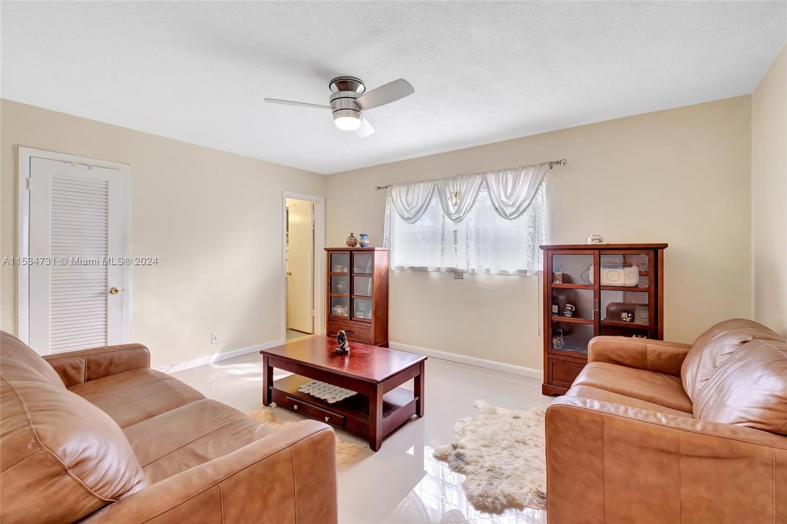 Guest bedroom, with great ambiance, lovely porcelain floors.