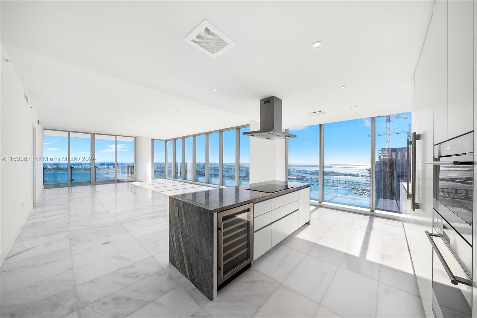 Don't miss out on this incredible opportunity to rent a spacious 4-bedroom/6-bath, high floor unit at Missoni Baia, offering panoramic views of Miami’s skyline. Unit 4803 features 270-degree ocean, bay, and city views, along with a den, a dedicated staff room, and two 10' deep terraces providing the perfect setting to enjoy the stunning views. The flow-through floor plan, marble floors, and 10’ floor-to-ceiling windows create a bright, airy living space. The kitchen boasts WOLF & Sub-Zero appliances and custom-designed Italkraft cabinetry. With private elevator access, two reserved parking spaces, world-class amenities, and a prime location just minutes away from the Design District, Miami Beach, Downtown, and Brickell, Missoni stands as Miami’s newest move-in-ready new development.
