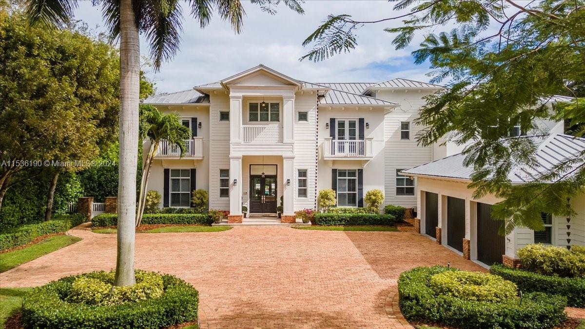 Whoever says love at first SITE isn’t real has not seen this stunning 2-story Coastal Contemporary Estate on a North Pinecrest Acre. Detailed features such as grand foyer, formal living and dining areas, wine cellar,fireplace, in-law quarters, wet bar, plantation shutters, and ornate tray ceilings throughout home. The Backyard is spectacular with pool, spa,1/2 Court basketball, 2 pavilions, summer kitchen, and an upstairs balcony above the huge patio downstairs that overlooks an entertainment paradise! Not one detail has been missed in your dream home.