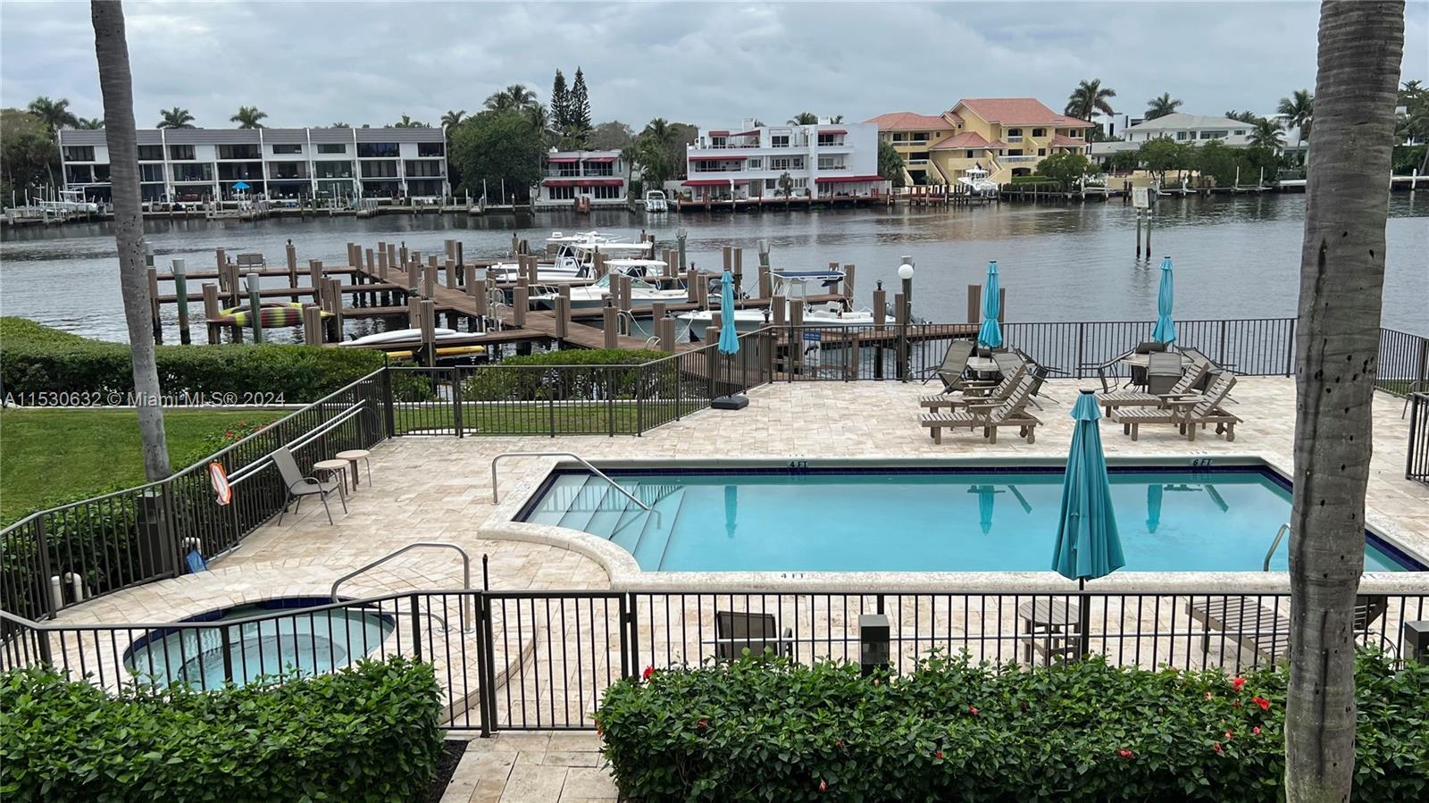 This stunning condo offers unparalleled sunset views of the Intracoastal Waterway with exclusive access to private pool, hot tub, marina & dock for boats up to 40' perfect for boating enthusiasts seeking the ultimate coastal lifestyle. Upon entering, you'll be greeted by an abundance of natural light, open floor plan, updated kitchen, breathtaking panoramic vistas of the Pool, Marina & ICW, creating a serene ambiance that is truly unmatched. Your private balconies provide captivating sights & sounds of the waterfront lifestyle. Whether you're enjoying your morning coffee or hosting soirées, this outdoor oasis provides the perfect backdrop for relaxation & entertainment. Immediate Rentals allowed, very close to the beach, restaurants & shopping. Minutes to major highways and the airport!