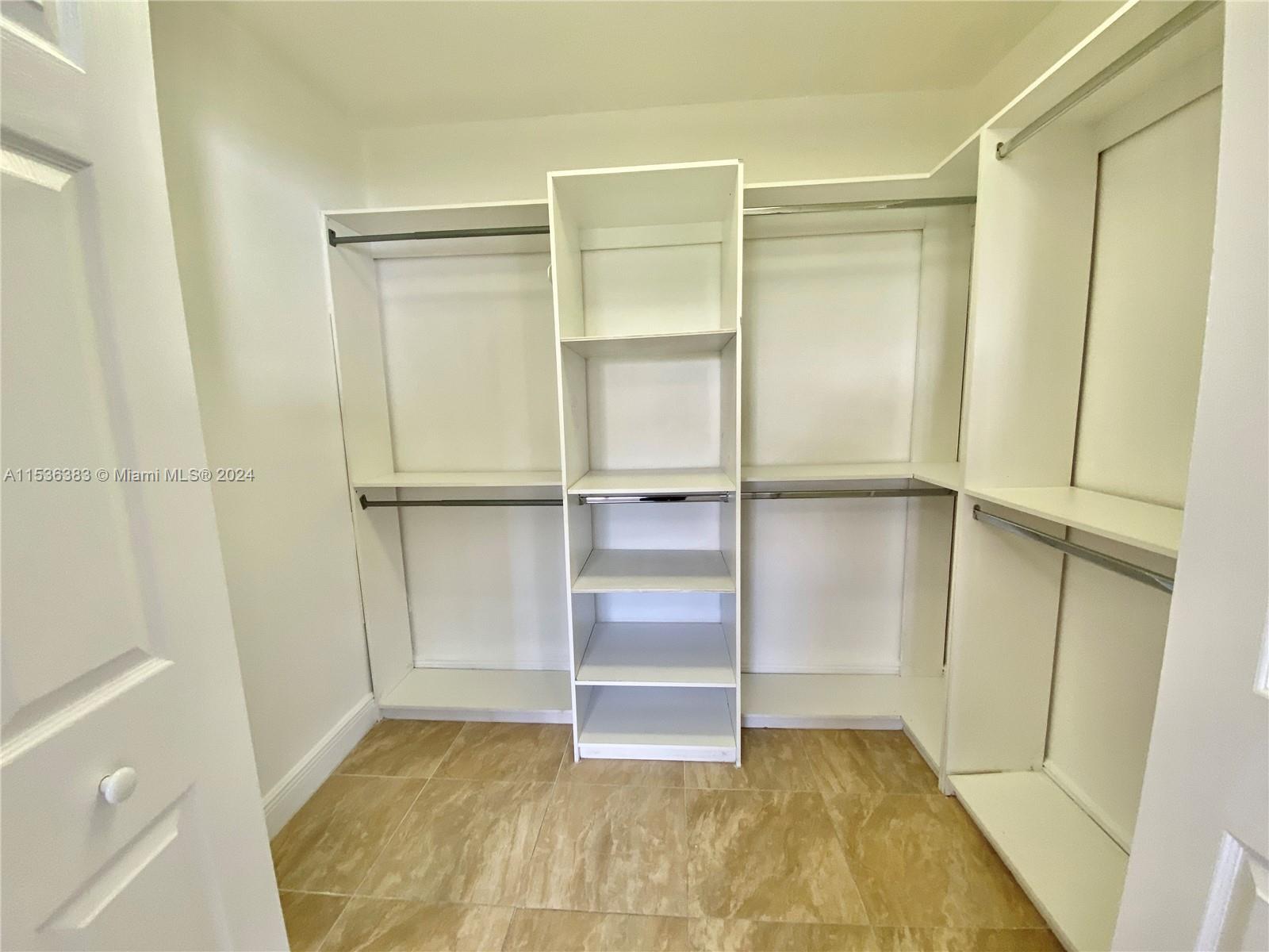 Spacious Walk In Closet In Master Bedroom