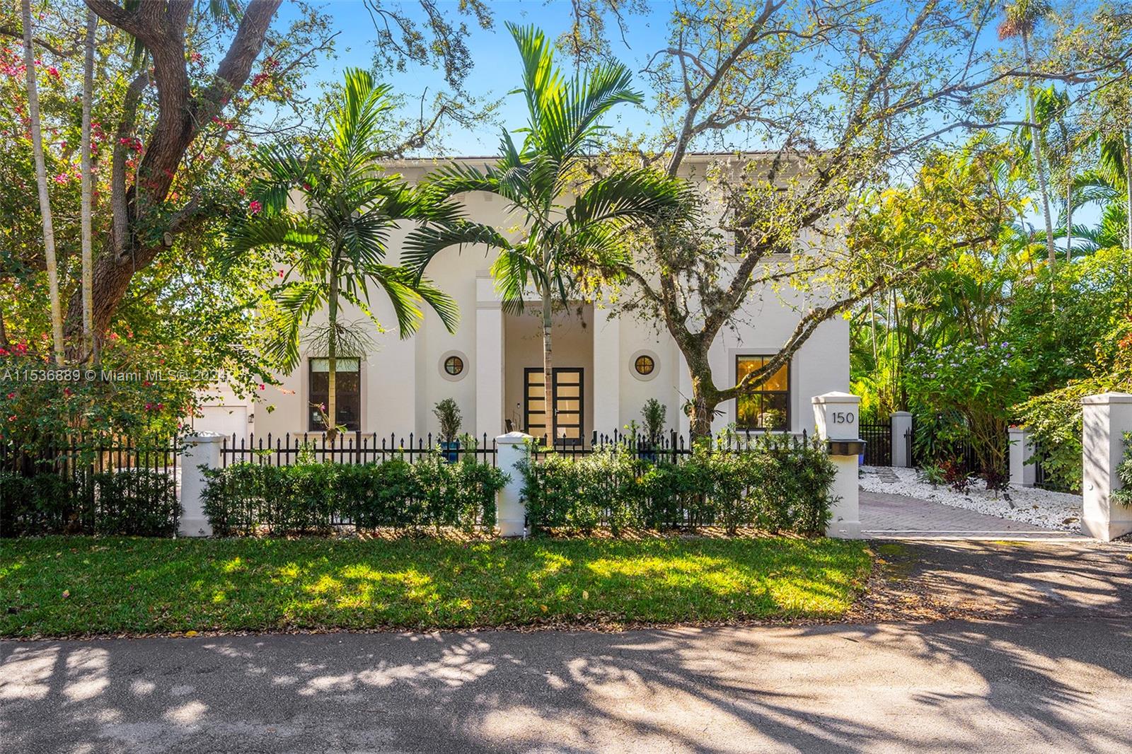 This sophisticated and elegant retreat was designed to offer comfort and absolute tranquility. The soaring front entry leads to an open floor plan that blends indoor and outdoor living. The light-filled living room with floor-to-ceiling windows offers views of the pool and courtyard. Situated beside the dining room is a modern kitchen with high-end appliances, white quartz island, and a breakfast bar with seating that opens to a family room, ideal for entertaining. Also on the first level is the main suite, with a stunning spa-like bathroom, walk-in closet, and glass doors that open to a pool and patio area with comfortable seating. Upstairs are 2 additional bedrooms, with en-suite bathrooms. The spacious driveway and a 2-car garage complement this extraordinary home.