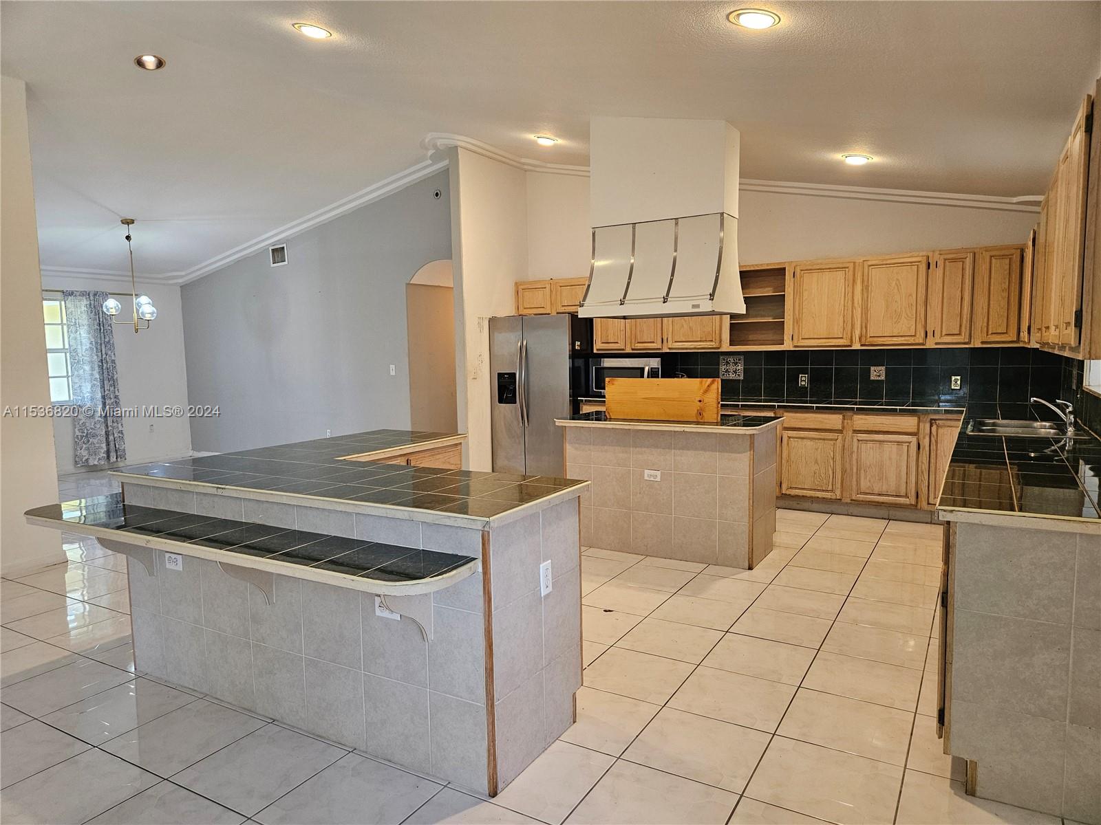 Island Kitchen w/formal Dining Room in the background