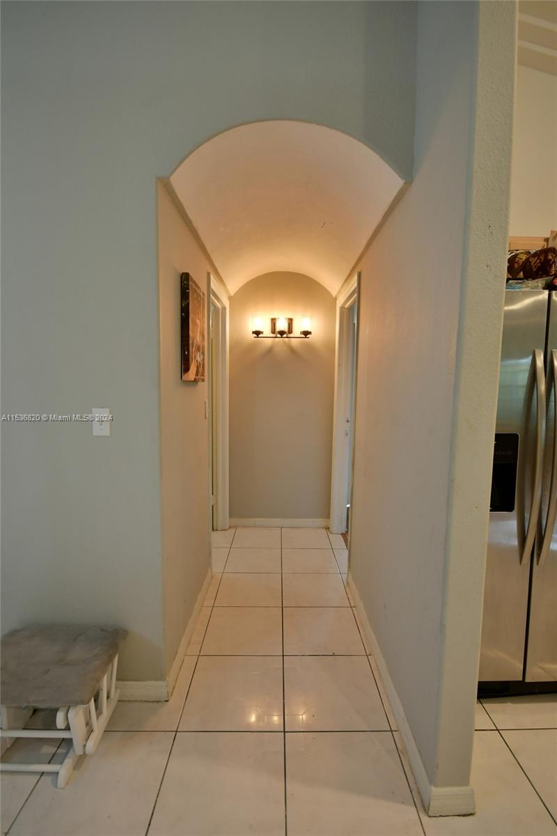 Hallway to Split Plan Primary Bedroom Suite