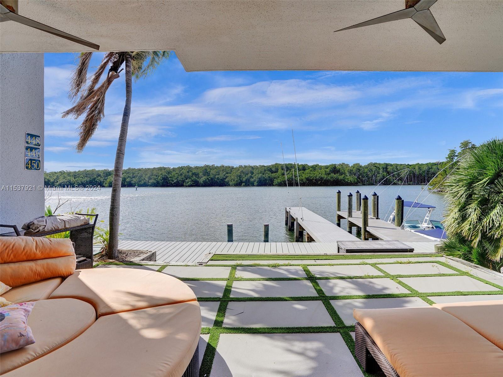 Poinciana island Stunning duplex 3 bedrooms 4 bathroom fully renovated with open bay views and two boat docks! This beautiful home is located inside the prestigious community of poinciana island with 6 tennis courts, a pool house, a security gate and 24 hr service.