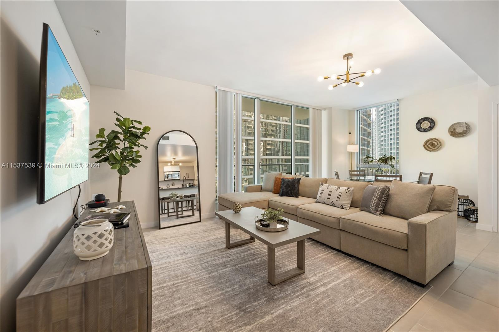 This 2-bedroom split plan corner unit in the heart of downtown is fully furnished and recently updated with Italian Cabinetry, Stainless Steel Appliances, Granite Countertops, Washer & Dryer and Walk-In Closets. Met One has an amazing Gym and Club Room! Please note that the pool will be closed for an extended period of time. Water, basic cable and Internet included. One assigned parking space. Walk to Whole Foods, Bayfront Park, Metro Mover and Novikov Restaurant downstairs, Joe & The Juice and 16-screen Silverspot Cinema at Met Square. Building offers luxurious life style, 24-hr front desk attended. Downtown Miami living at its best!