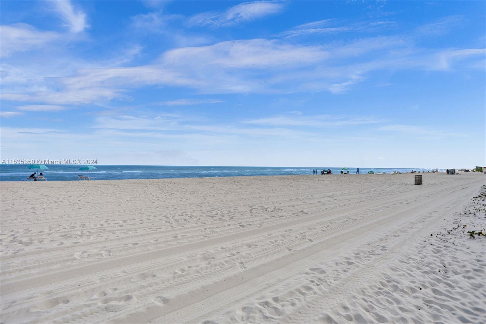 EXIT TO THE POOL AND BEACH AREA