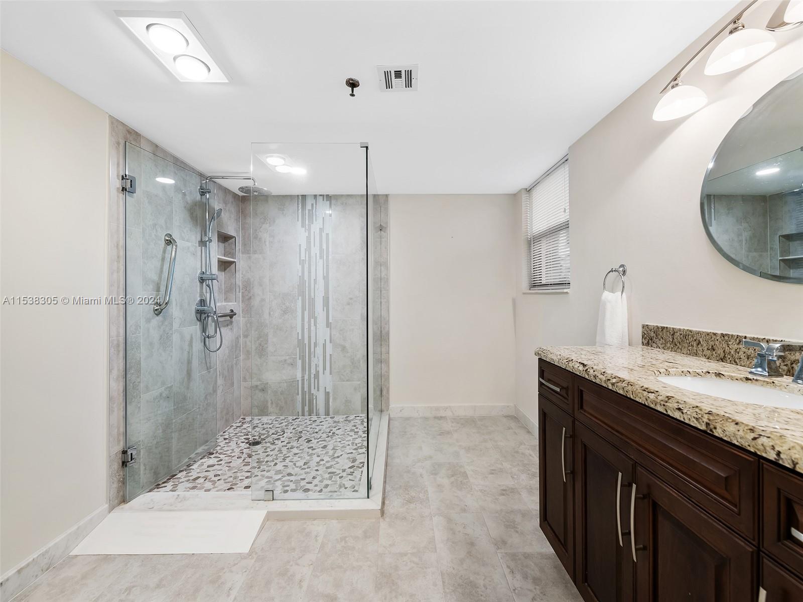 Renovated master bathroom with large stand alone shower