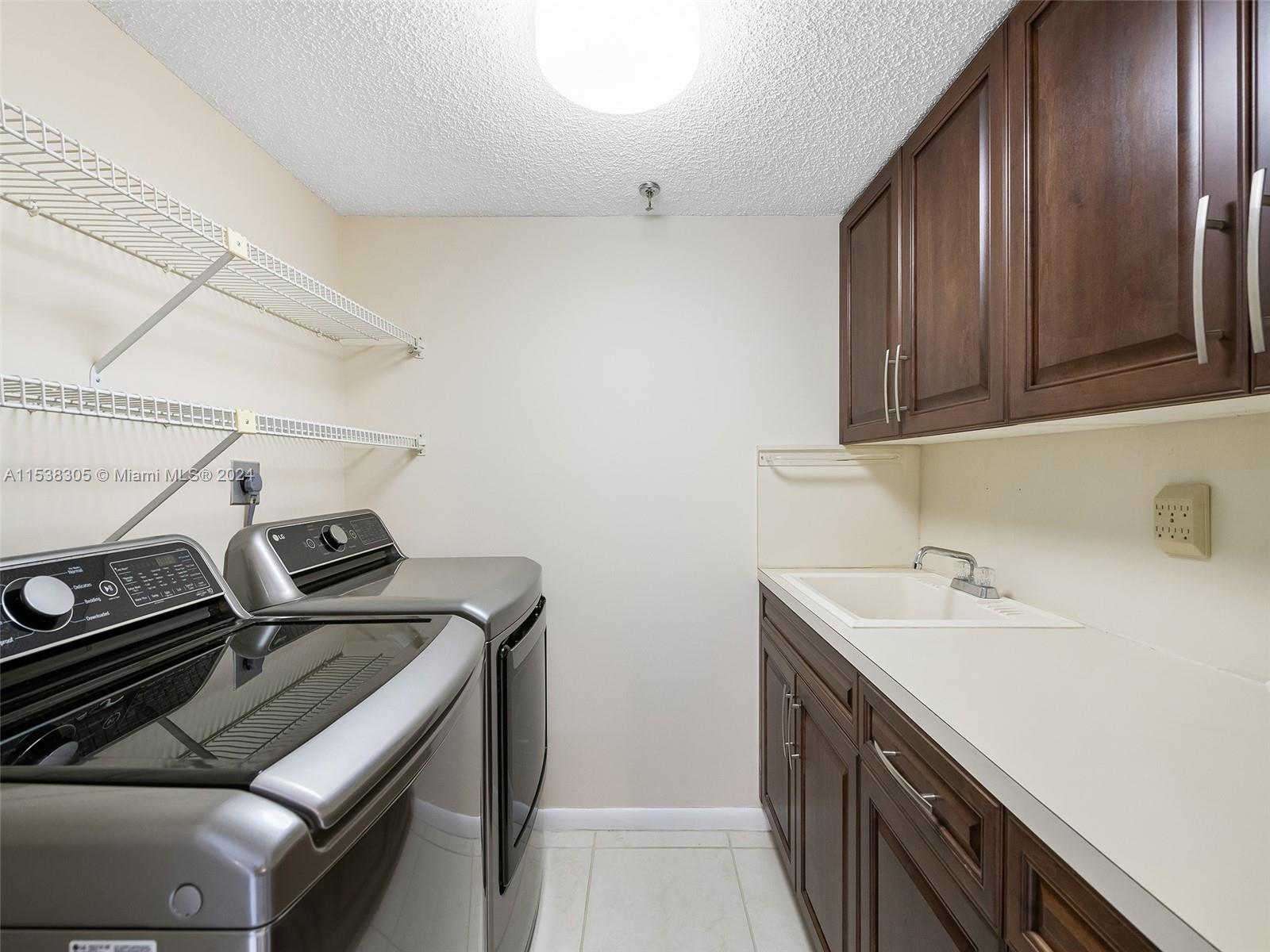 Separate Laundry room with brand new washer and dryer