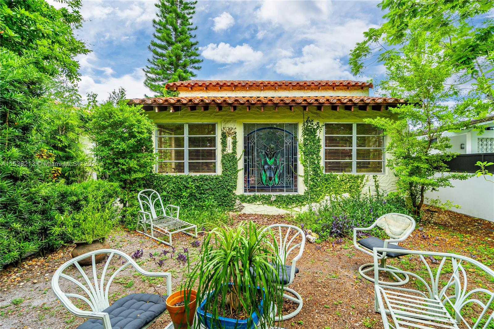 Charming 1925 Spanish-style home in Coral Gables now available! This historic property boasts 4 beds, 2 baths, and original wood floors exuding timeless elegance. Additionally, there is a separate two-story cottage with 2 bedrooms, 1 bathroom, perfect for guests or additional rental income. The spacious patio provides a serene outdoor space for relaxation or entertaining. Don't miss out on this unique opportunity to own a piece of history in one of Coral Gables' most desirable neighborhoods!