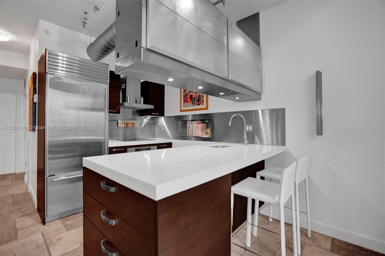 Open Kitchen w/ SubZero & Miele appliances