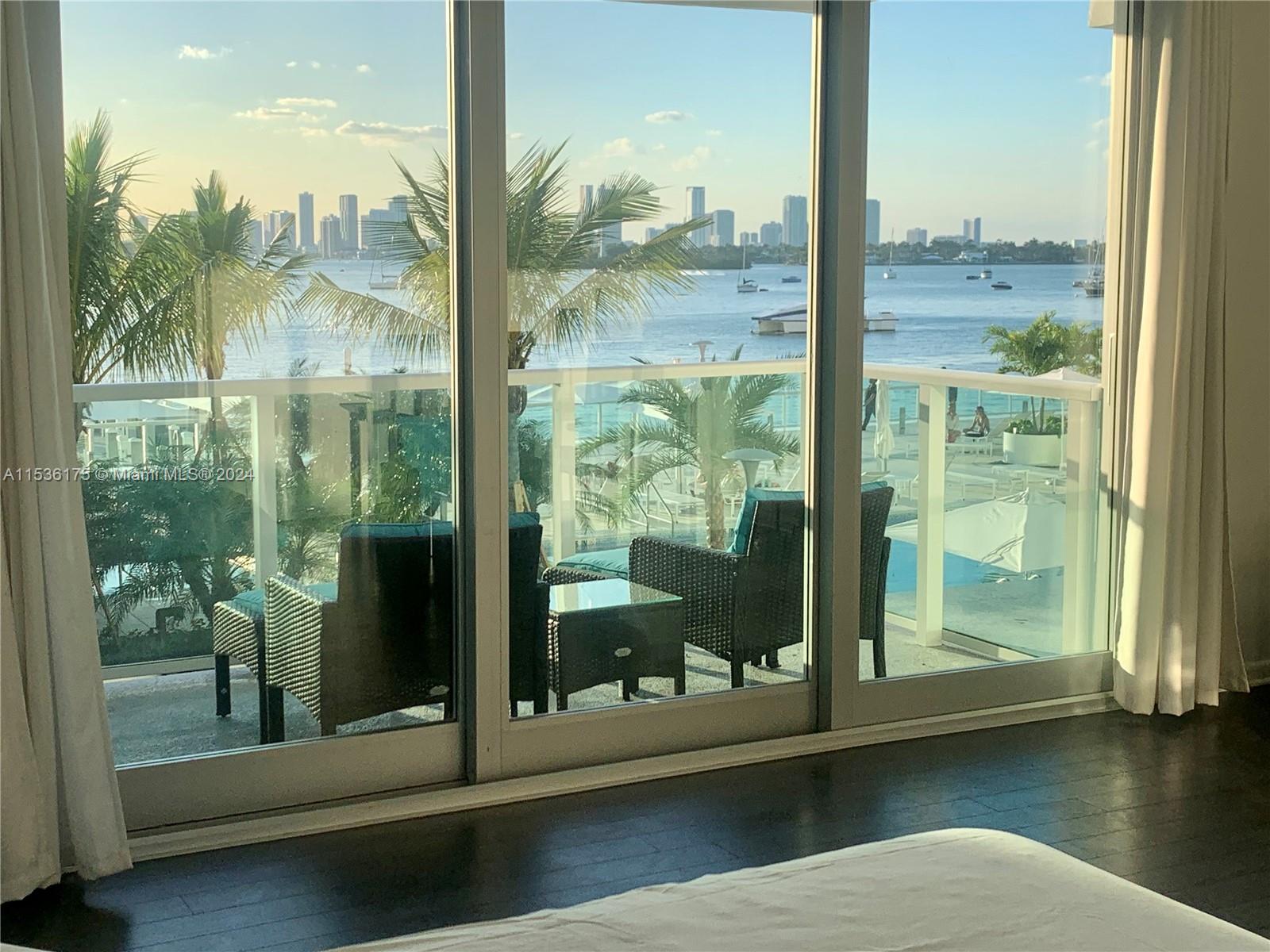 *** Best deal with Assigned parking, Balcony on the Bay like on a Boat from your bed, on stunning sunsets Bay & downtown views *** One of the best places to rent in South Beach Resort Style, 5000 Sf Fitness Center, next to Mondrian with ASSIGNED covered PARKING. Unit Just Repainted with walking closet and more - All New from: Big Smart TV, Fridg, Induction cooktop, hood, Microwave, Fryer * Nice Location: Walk to Starbucks, facing Wholefoods, next to 5 Star Mondrian Hotel, Lincoln Rd & Ocean Drive. Marble bathroom & wood floors. Just Upgraded Building with Pool Renovation, Lobby and hallways redone! Rent includes: Premium HD cable, high speed internet, hot water, Parking place assigned (Value go to $175) 24h security & convenience store over opened long hours.