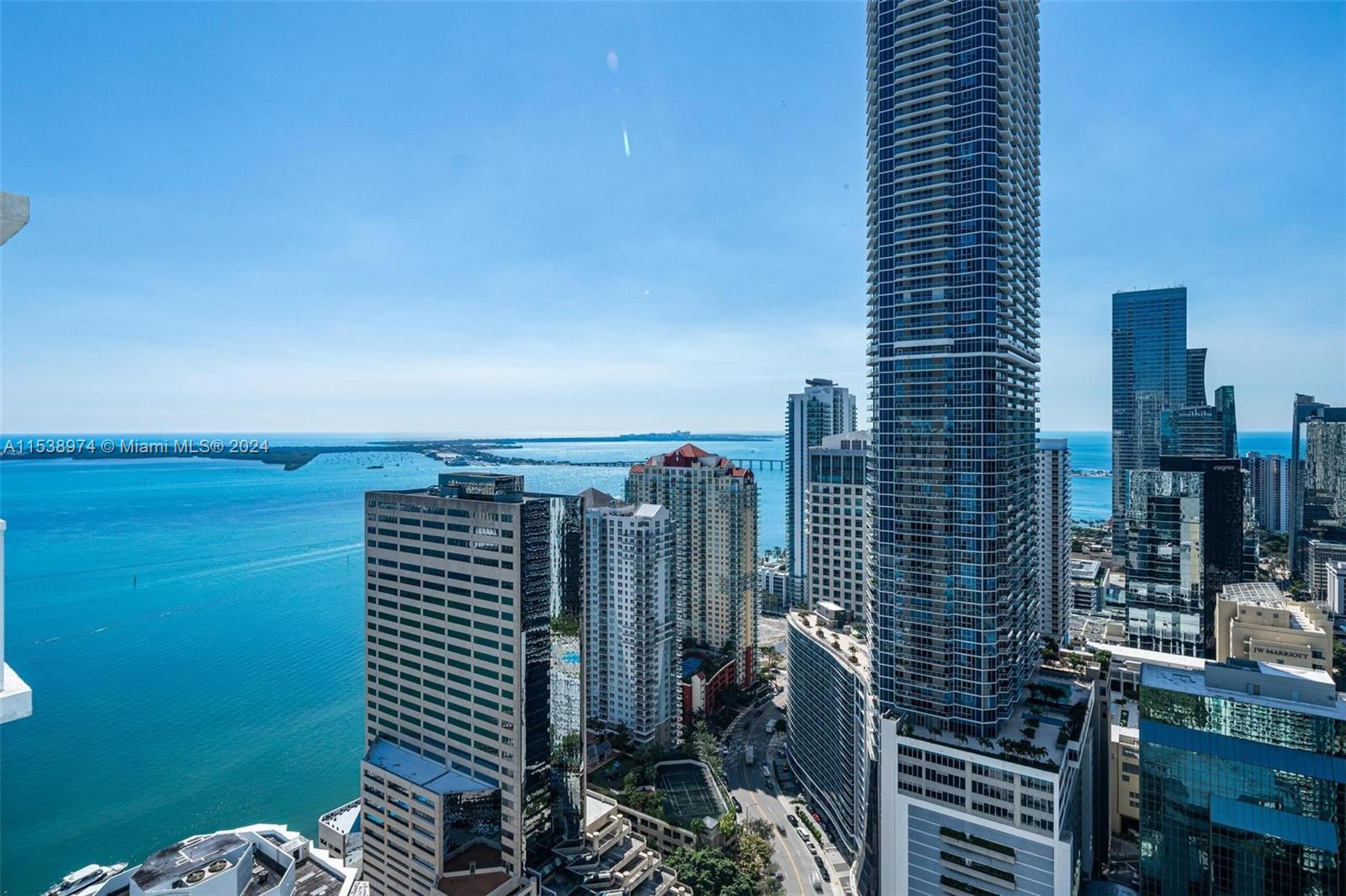 Welcome to the absolute best and upgraded 1bed/1bath with stunning water views of biscayne bay at Plaza Brickell. Features include: wood porcelain tile floors throughout, high ceilings, upgraded appliance package including GE Monogram appliances, custom backsplash in the chef kitchen, floor to ceiling windows in the living room, upgraded bathroom vanity, custom built in closet in the master bedroom, large terrace w/stunning water & skyline views & more. Located in the best part of Brickell steps to Mary Brickell Village, Brickell City Center, Metro Mover, shops & restaurants. Have access to world class amenities including: 2 infinity pools, large gym, business center, children's room, movie theatre and party room. LOW HOA & flexible renting terms of 31 days makes this a great opportunity.