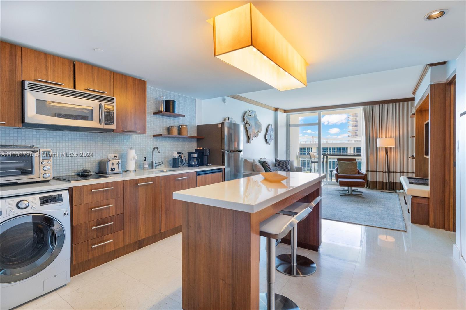 Upgraded kitchen with Miele cooktop and full size refrigerator/freezer